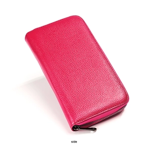 Detailed side view of the rose red lychee grain leather wallet with gunmetal zipper