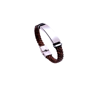 Close-up of brown braided leather bracelet with a polished silver metal plate and clasp