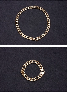 Detailed view of a classic gold Figaro link bracelet featuring a secure lobster clasp