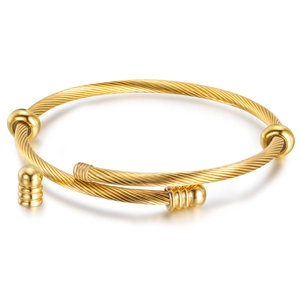 Detail of 3mm gold twisted cable bangle with polished sphere ends and decorative beads