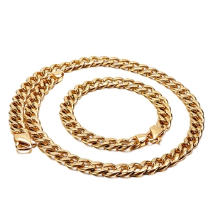 Polished gold stainless steel necklace and bracelet set for men and women on white