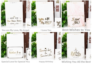 Detail view of 6 minimalist greeting cards with gold foil lettering for birthdays and gifts