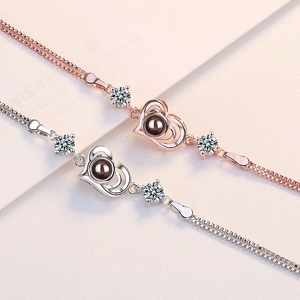 Elegant heart projection bracelet in rose gold and silver with cubic zirconia