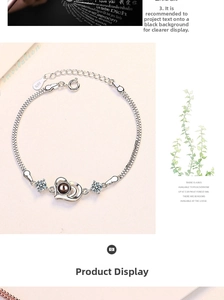 Macro detail of S925 sterling silver lobster clasp and heart projection stone pendant
