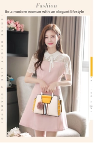 Fashionable beige and yellow large tote bag with color stripes and fur pompom detail