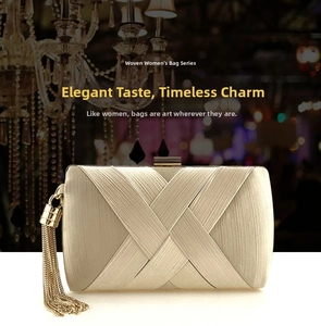 Champagne gold evening clutch bag featuring a woven texture and elegant metal tassels