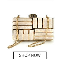 Detailed view of rectangular clutch bag with white marble texture and gold metal frame