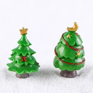 Miniature Christmas resin trees with gold star and moon toppers for snow micro landscapes