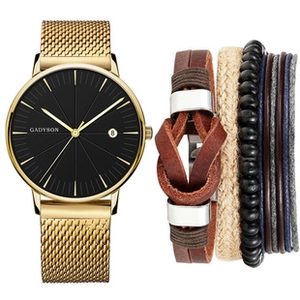 Detail of GADYSON gold mesh watch with black dial and layered leather bracelet set
