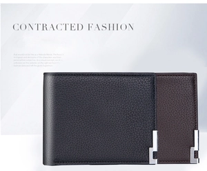 Detail of lychee textured men's wallets in black and brown with metal corner trim