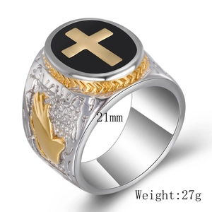 Men's vintage cross ring with prayer hands engraving in silver and gold-tone steel