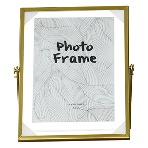 Minimalist gold metal frame 5x7 with thin wire edges and standing bracket display