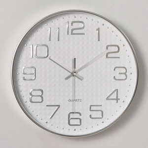 Modern 12-inch silent wall clock with silver 3D numerals and white textured square dial