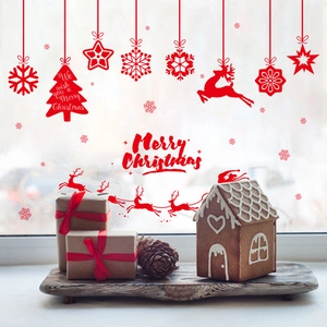 Red Christmas window stickers featuring reindeer, snowflakes and Santa Claus silhouettes