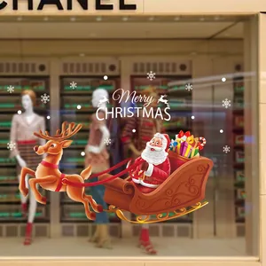 Christmas window stickers with Santa sleigh, reindeer, and snowflakes for holiday glass decor
