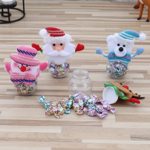 Detailed view of Christmas candy jars featuring Santa, Snowman, Bear and Reindeer characters