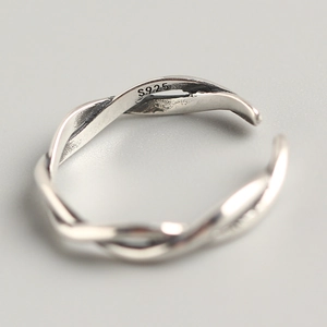 Minimalist S925 sterling silver twisted wave open ring featuring professional hallmark