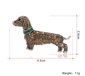 Detailed view of dachshund brooch with rhinestones showing dimensions 4.5cm by 2.6cm