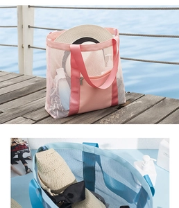 Close-up of mesh beach bag with zipper pocket and spacious interior for travel items