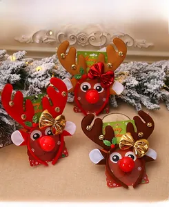 Detail of Christmas reindeer antler headbands with sequins, bells, and glowing red noses