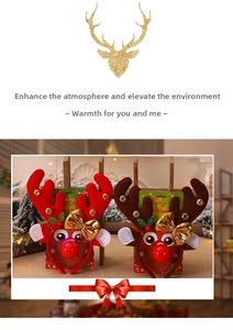 Detail of Christmas reindeer antler headband with festive sequins and golden bows