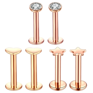 Three-piece rose gold stainless steel lip studs with heart, star and zircon designs