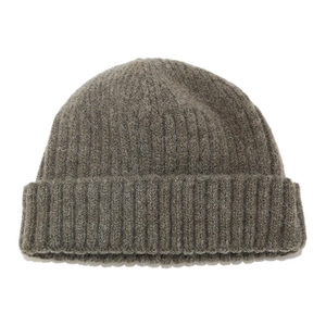 Detailed texture of dark grey rib-knit beanie hat with fuzzy wool blend fibers