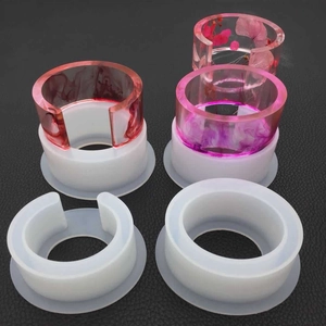 Detail of C-shaped and round silicone molds for DIY crystal resin flower bracelets