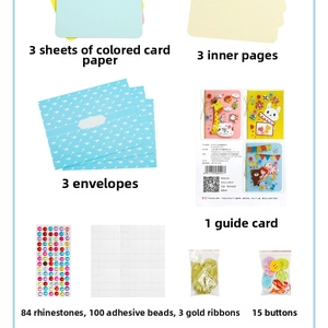 Detailed DIY Christmas card kit components including cardstock, envelopes, and glitter gems