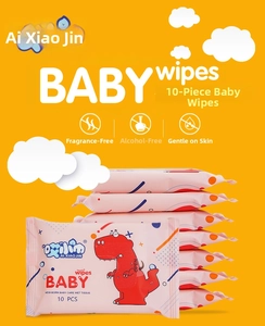 Stack of pink portable baby wet wipes with dinosaur design and gentle formula