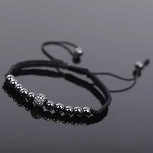 Adjustable black hematite beaded bracelet with micro-paved rhinestone ball and woven rope