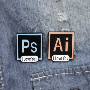 Detail of Ps and Ai enamel pins on denim with I Love You text banners and vivid colors