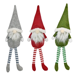 Three Christmas faceless gnomes with long legs in red, green, and gray festive colors