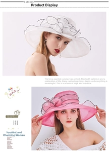 Detail of elegant organza sun hats featuring oversized flowers and contrast edging