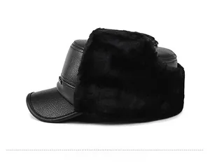 Close-up of black faux leather winter trapper hat with thick fur lining and ear flaps