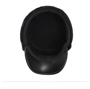 Detail showing the thick plush lining and premium black leather brim of the winter hat