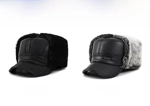 Detail of winter trapper hats showing textured faux leather and thick artificial fur lining
