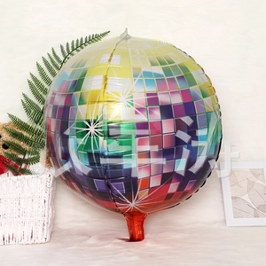 Detail of round disco ball aluminum balloon with colorful check pattern and valve