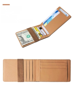 Detailed view of brown leather money clip wallet with elastic band and card slots