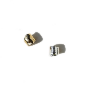 Minimalist irregular gold and silver ear cuffs with high-polish metallic finish