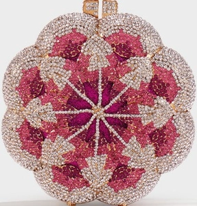 Close-up of pink gradient floral evening clutch bag with luxury crystal rhinestone petals