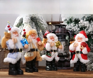 Set of four Santa Claus figurines in colorful festive outfits with holiday scene