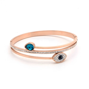 Bracelet manchette or rose œil protecteur avec zircon bleu et cristaux multicouches