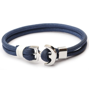 Handmade navy blue paracord woven bracelet with a silver metal anchor clasp