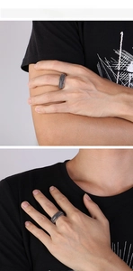 Detail shot of vintage silver tire tread pattern on stainless steel biker ring for men
