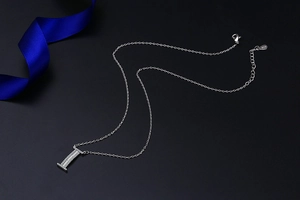 Detailed close-up of S925 sterling silver letter I pendant with white zircon stones