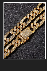 Macro view of gold-plated Cuban chain with dense zircon inlay on a dark texture