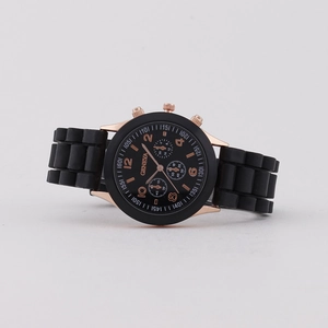 Fashionable Geneva quartz watch with black silicone strap and rose gold three-eye dial