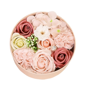 Pink round gift box with artificial soap roses carnations and pearl decor for Valentine Day