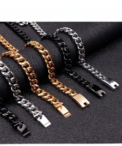 Detailed macro view of Cuban chain bracelets in gold, silver, and black polished finishes